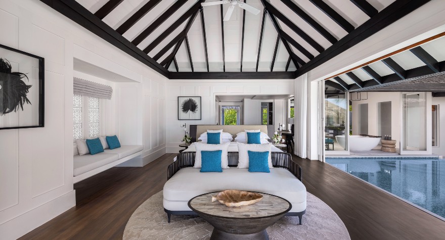 Guest bedroom of the Two Bedroom Ocean House with Pool at Naladhu Private Islands Maldives